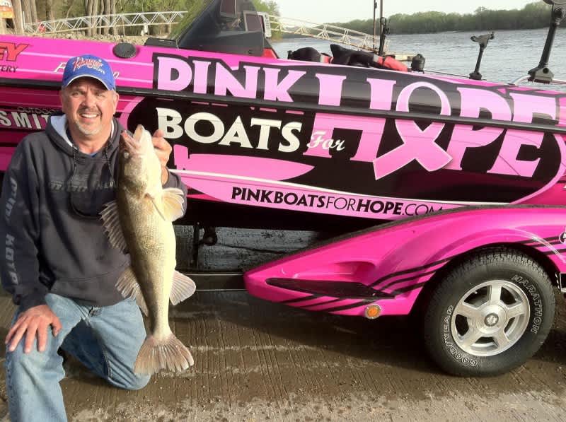 Professional Walleye Fishermen Behind Pink Boats for Hope