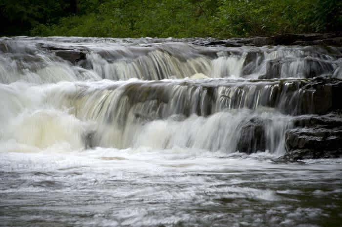 Welcoming Waters of Northern Michigan’s Ocqueoc Falls Have Universal Appeal