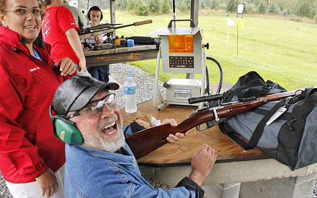 Smiles, Rifles and Pistols Meet NRA’s Electronic Targets
