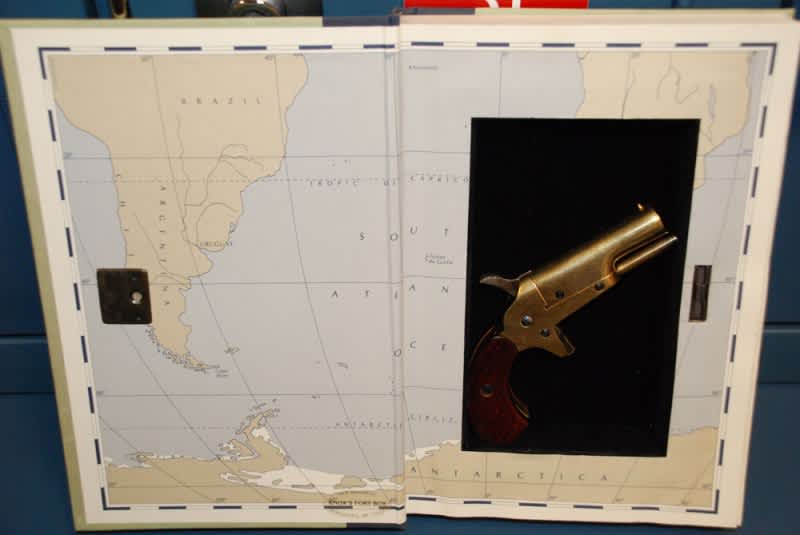 Antique Handgun Found in Hollowed-out Book Donated to Public Library