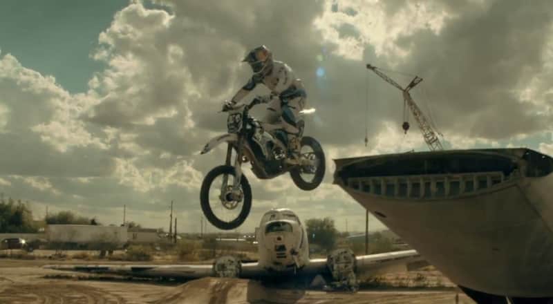 Video: Maddison Pits Dirt Bike Against the Skeletons of Planes