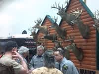 Wardens, Wall of Shame Gets Crowd Talking About Stopping Poachers