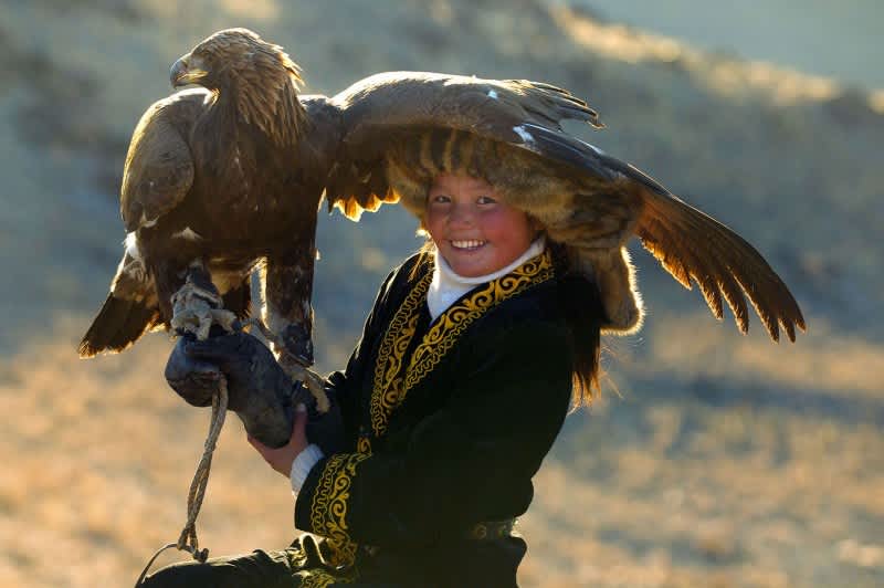 A Girl and Her Eagle: Photos of an Ancient Hunting Tradition