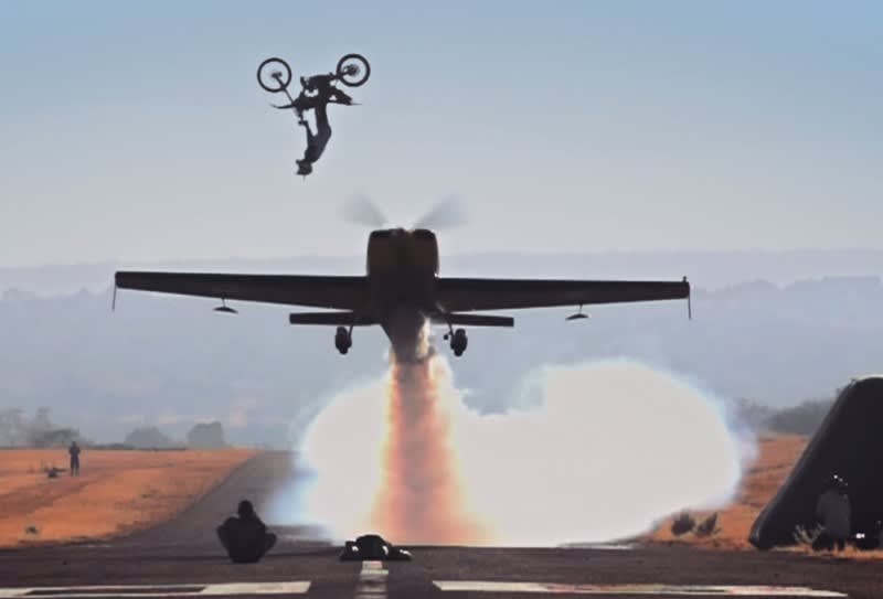 Video: FMX Daredevil Jumps Over Stunt Plane