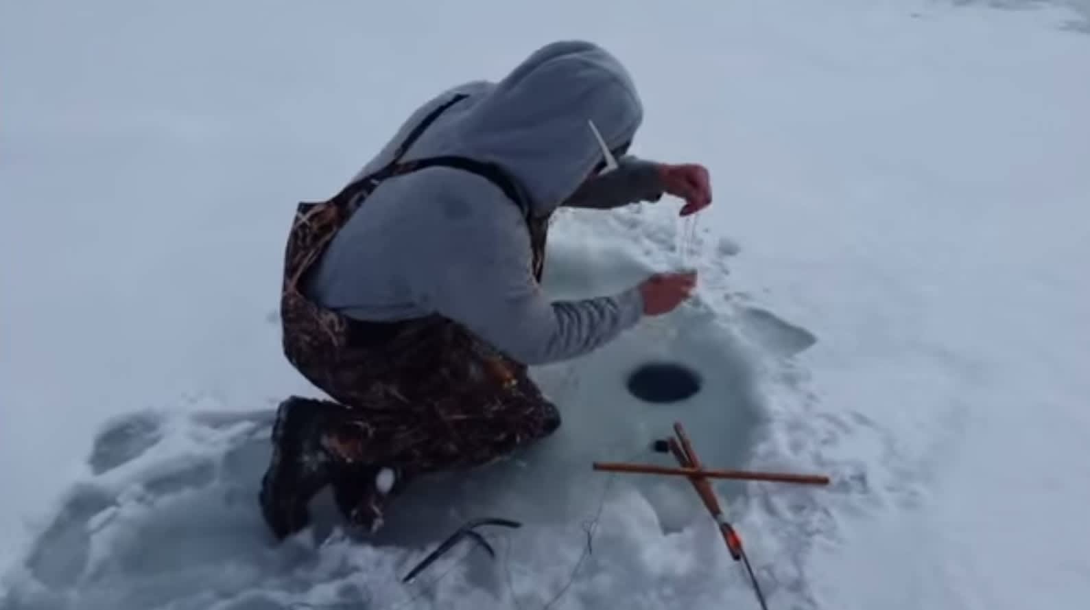 Video: Ice Fisherman Pulls Duck Out of Fishing Hole