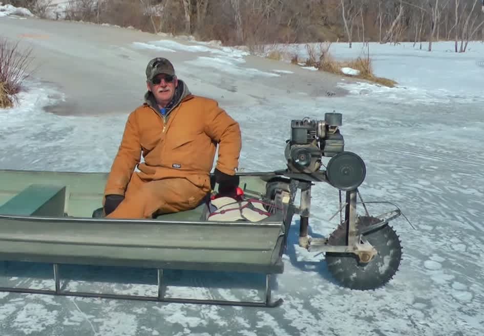 Video: Man Uses Saw Blade, Old Jon Boat as Motorized Ice Sled