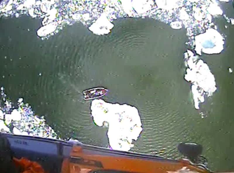 Coast Guard Uses Helicopter as Ice Breaker to Clear a Path for Trapped Anglers