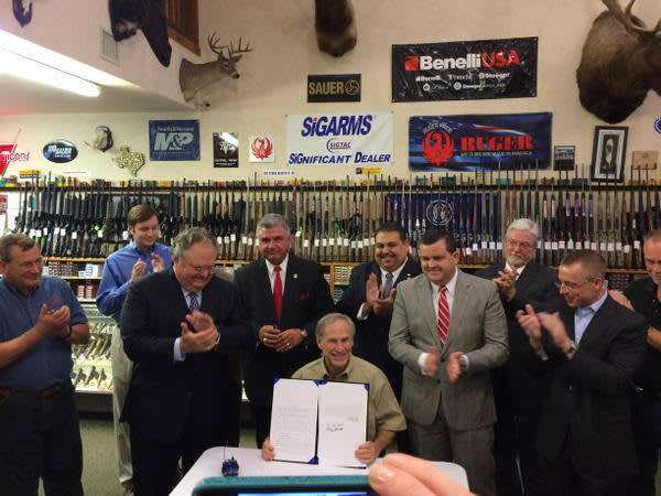 Texas Governor Signs Open Carry, Campus Carry Bills at Gun Range