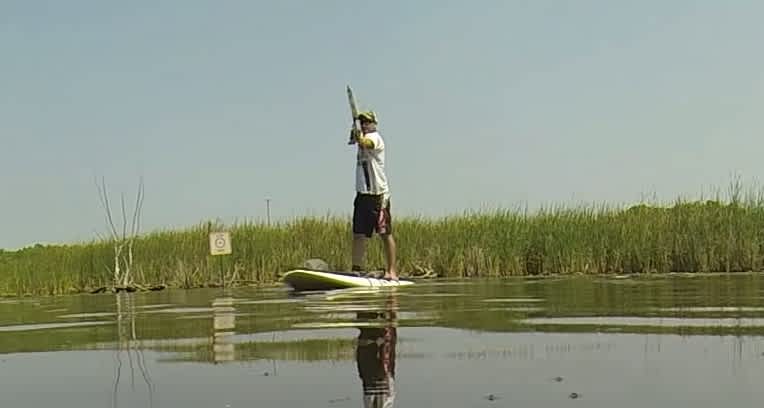 Video: Paddleboard Bowfishing is Serious Summer Fun