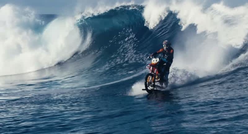 Video: Man Rides Giant Tahiti Waves with Dirt Bike