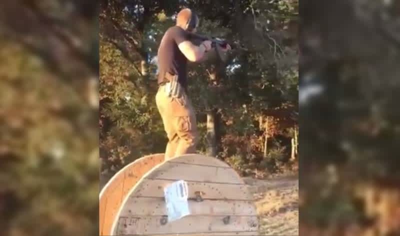 Video: Man Does Barrel Walk While Shooting AK
