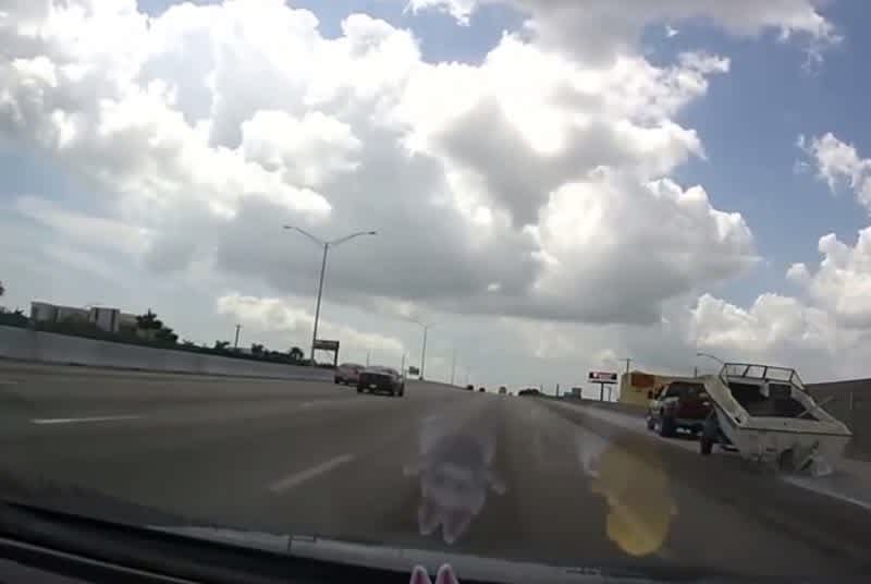 Video: Boat Slides Off Trailer and onto Busy Highway (Warning: Graphic Language)
