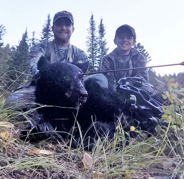 Quick Thinking Hunter Arrows Charging Black Bear