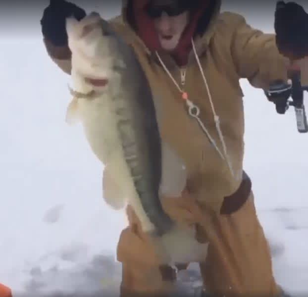 Catching Monster First-Ice Bass Turns Man into Little Kid Again
