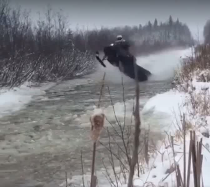 Fail Video: Snowmobile Water Skipping Gone Wrong