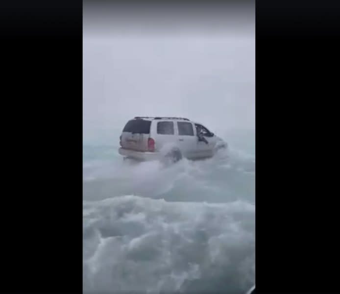 Video: Ice Fishermen Driving Across (Un)Frozen Lake