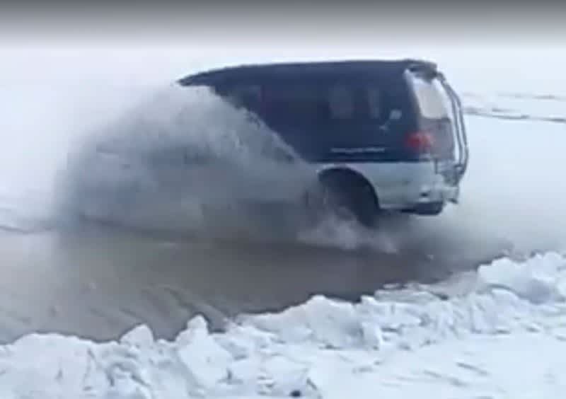Video: Van Makes an Insane Jump Over an Un-Frozen Section of Lake