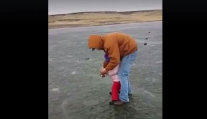 Video: Toddler Battles Gigantic Rainbow Trout on Clear Ice