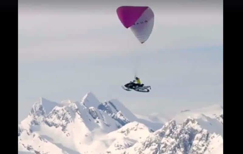 Video: Snowmobile + Hang Glider = Epic Mountain Adventure