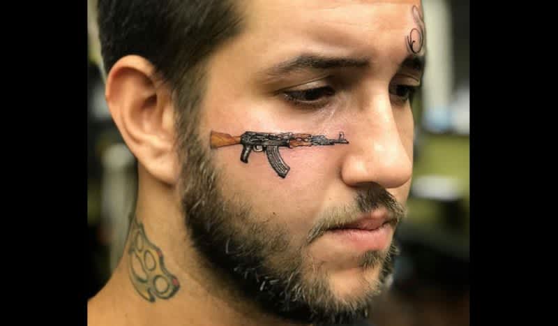 Think This Guy Will ‘Ragret’ Getting an AK-47 Face Tattoo?