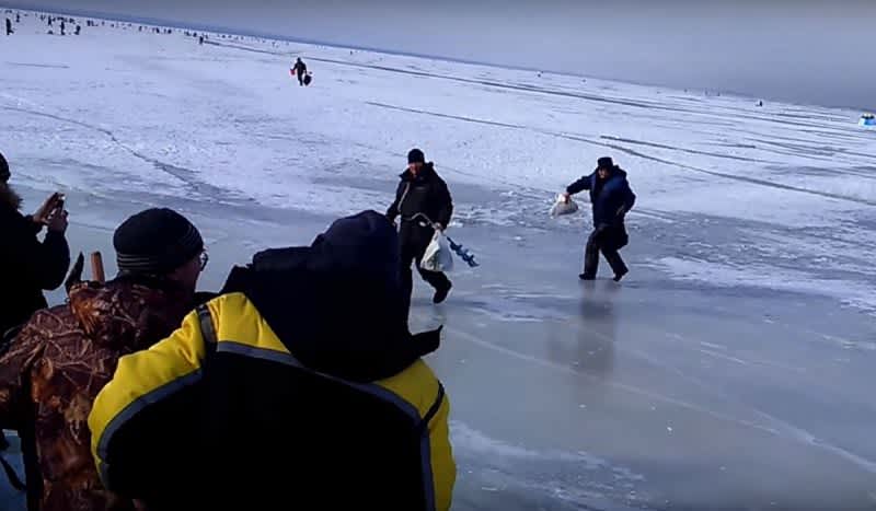 Video: Wave Moving Under Ice Causes Anglers to Sprint For Shore