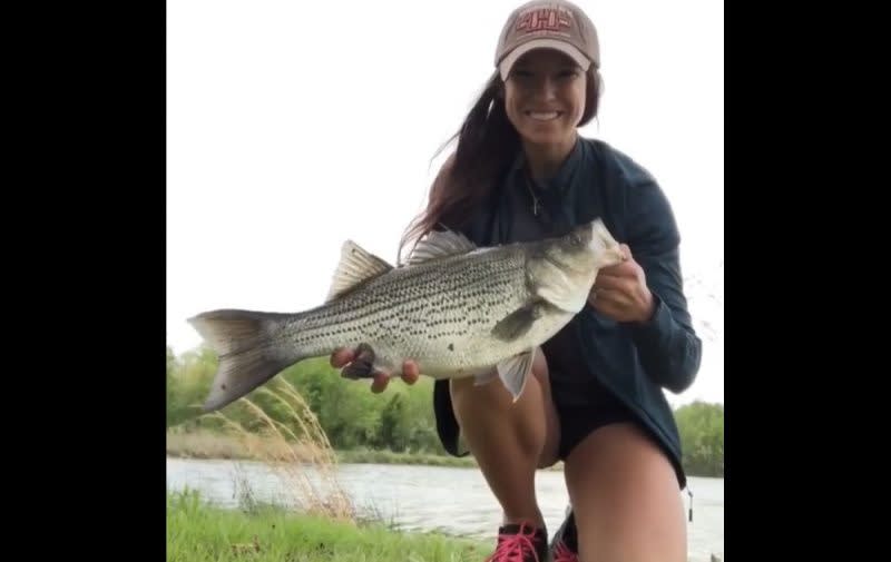 Video: Brittany Jill Lands a Nice Hybrid Striped Bass That Put Up a Serious Fight