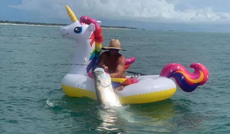 Florida Man Catches Huge Tarpon While Fishing from Rainbow Unicorn Floaty