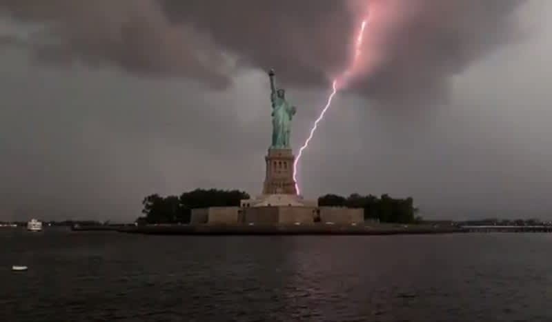 Lightning Strikes Lady Liberty in Dramatic Video