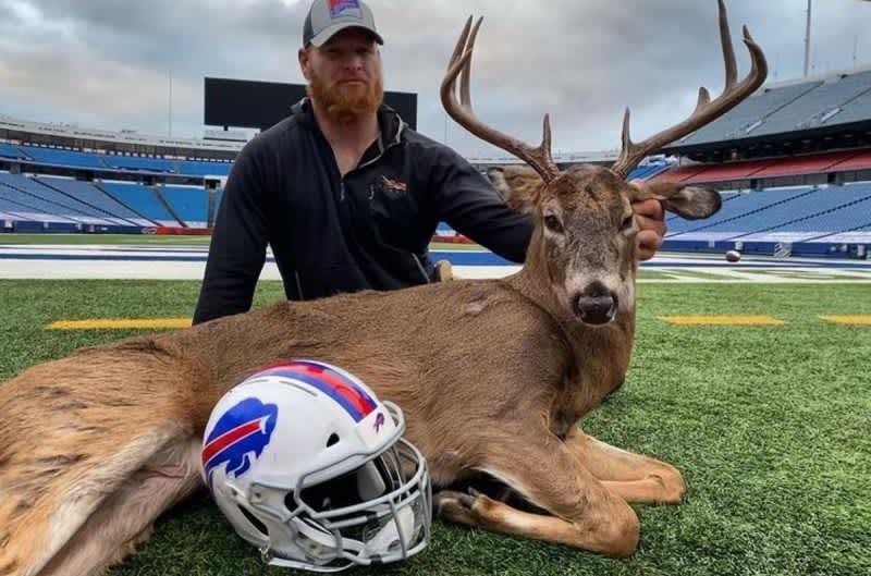 NFL DE Trent Murphy Poses with 10-Point Buck on Turf at Bills Stadium After Clinching AFC East Championship