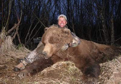 We sat watching the bear sleep for one-and-a-half hours before he woke up and we were able to take a shot.