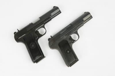 The M70A (left) is nearly identical to the Chinese Model 213 (right) with the exception of the longer grip found on the Serbian Tokarev.