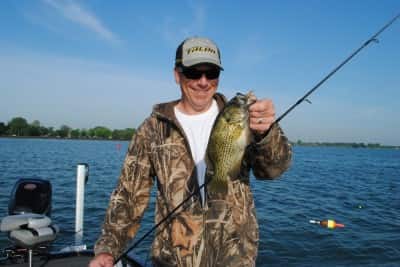 Joe Balog shows off a Lake St. Clair rock bass.