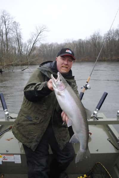 Miles Hanley runs plugs in the current to fool Kalamazoo River steelhead.