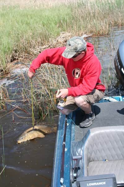 Find the warmest part of the lake in the spring and you will find the most fish. Shallow bays with vegetation and dark bottoms hold a lot of promise on sunny days.