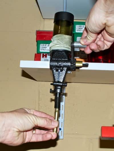As you can tell by the tape holding it together, this Lyman powder dispenser has some serious "mileage" on it.