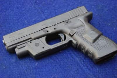 At last year's M3GI, the author used a Glock 17 with a rear-activated laser and front-activated light.