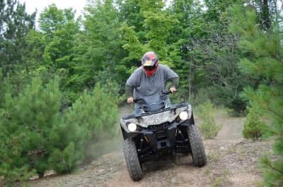 Transitioning from a seated to a standing position is quite easy. The ergonomics of the Outlander are pretty good for a wide range of riders. Image by Brandie Sigler.