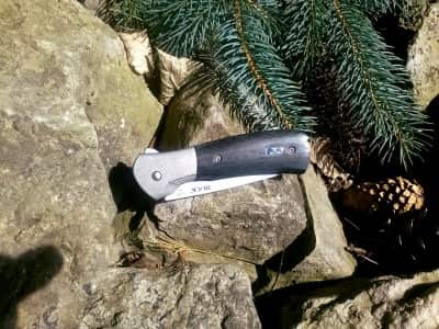 Ask one of your friends to try and open this knife. They'll probably take a while.