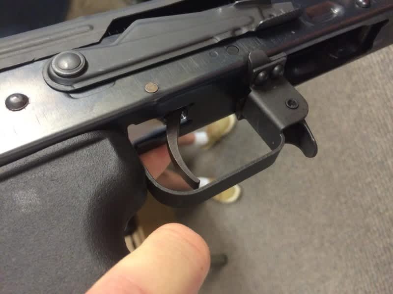 Yes, that's a Timney Trigger on an AK-47 rifle. Hold your horses though, it's still in the experimental stage and not ready for market.
