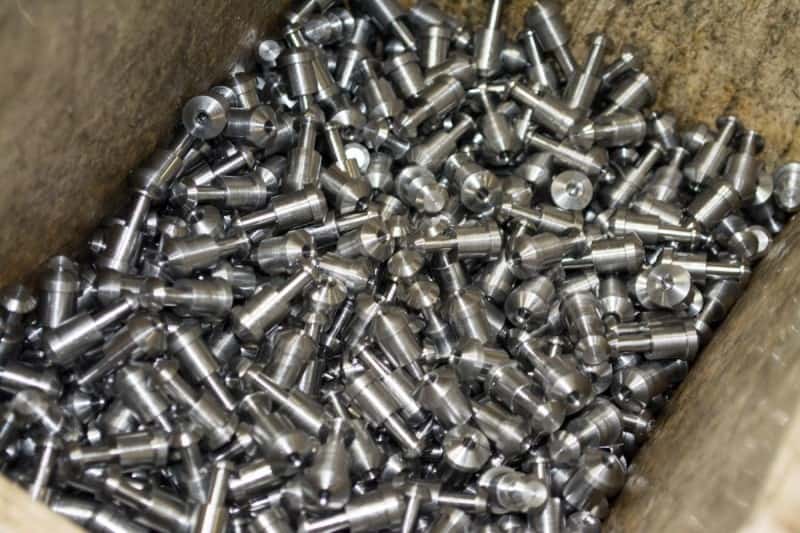 These Ruger 10/22 magazine latch plungers are milled from three or twelve foot sections of bar stock depending on the machine being used for the particular batch.
