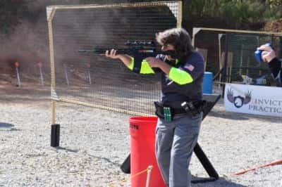 Julie Waasted engages a target with her rifle.