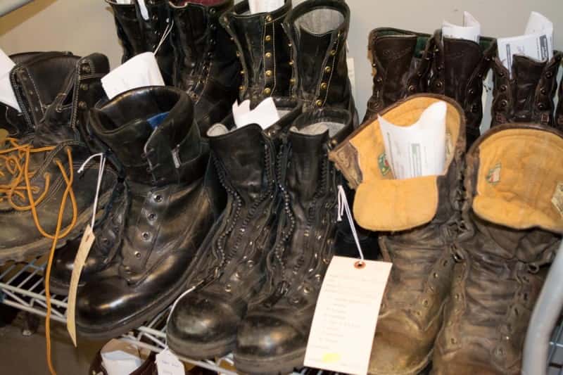 Some well-worn boots waiting on rehab at the recrafting center.