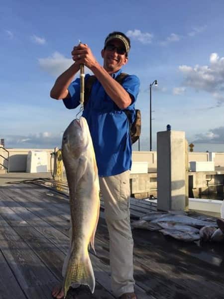 Samuel Sandoz holding up his state record tilefish.