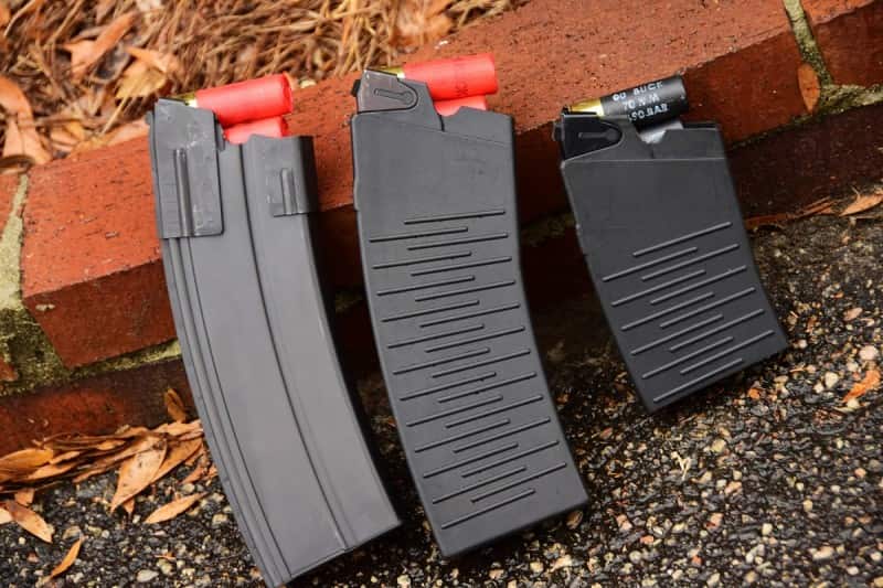 Russian-made magazines (center and right) for the Vepr 12 can be hard to find, but there are several manufacturers of US-made mags. The magazine on the left is made by CSSpecs and is all steel.