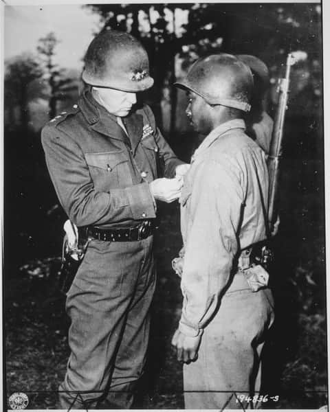 General Patton with his ivory-gripped SAA visible.