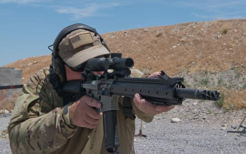 The author shooting the Barrett REC7.