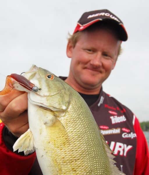 Jon Bondy shows off a typical Lake St. Clair smallmouth bass.