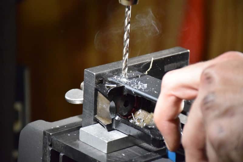 Drilling the receiver and front trunnion with the Bridgeport mill.