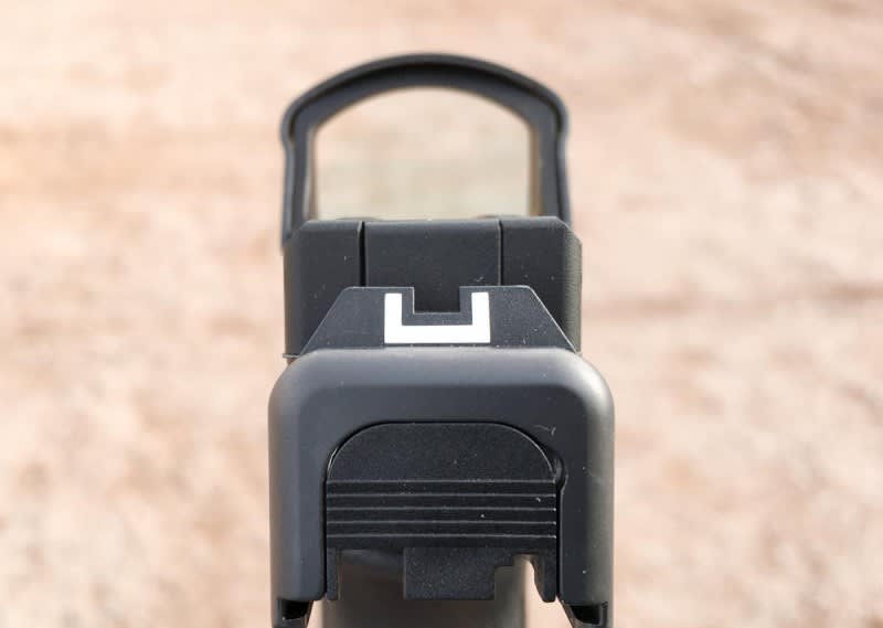 The Leupold is a little taller than the Trijicon RMR and won't cowitness with the factory sights either.