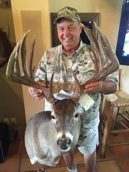 Holding Superbuck for the first time is bittersweet for Jim Stinson. He’s grateful that the buck was found but sad that it was taken illegally.